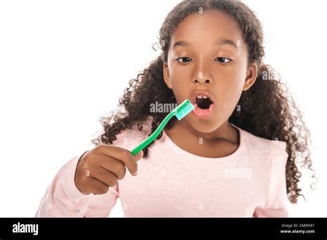 Adorable African American Kid Brushing Teeth Isolated On White Stock