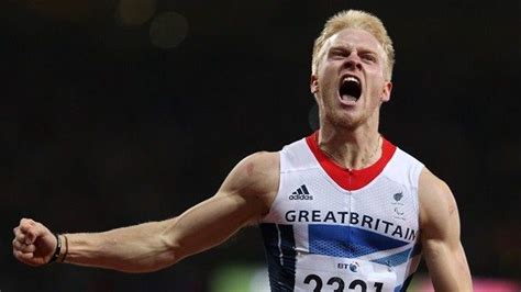 Jonnie Peacock Of Great Britain Celebrates Winning Gold In The Mens