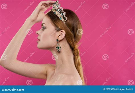 Charming Lady With A Crown On Her Head Naked Shoulders Earrings Make Up