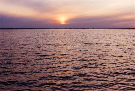 Sunset Reflection In Water Background Of The Water Surface At Sunset Scarlet Dawn Or Sunset On