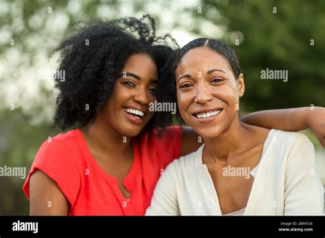 African American Mother Hugging Her Adult Babe Stock Photo Alamy