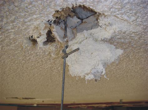 Identifying and dealing with asbestos ceiling tiles. Damaged Asbestos Spray-Applied Acoustical Ceiling Material ...
