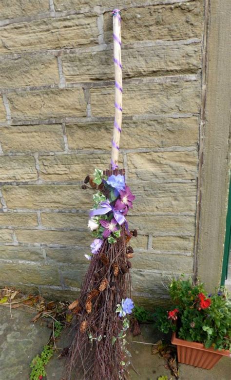The most inexpensive, flexible, and sturdy way i have found to store my mops brooms and dustpans is this: How to make a wedding broom for a jumping good time ...