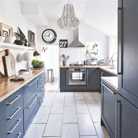 I went walnut and white. Navy kitchen ideas - to add an element of rich colour and ...