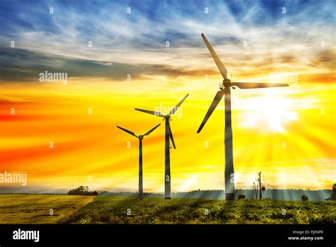 Eco Power In Wind Turbine Farm With Sunset Stock Photo Alamy