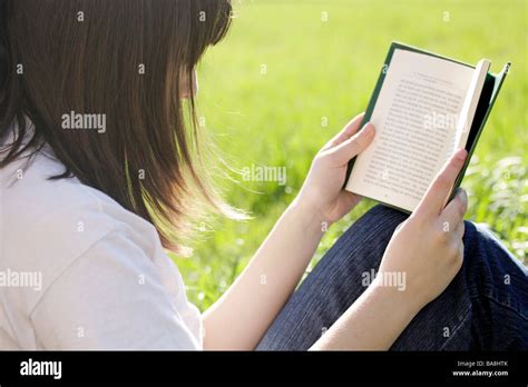 Reading A Book Stock Photo Alamy