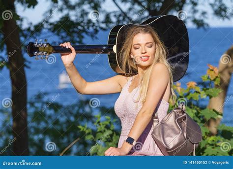 Woman Playing Acoustic Guitar In Park Stock Photo Image Of Musician