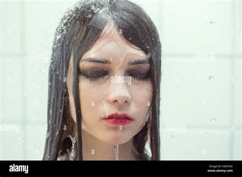 Close Up Portrait Of A Wet Crying Woman Under Shower Splashes Toned Image Stock Photo Alamy
