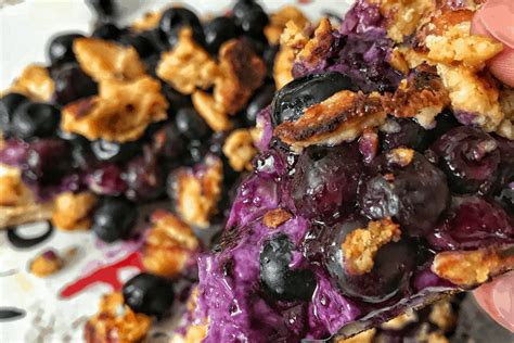 1 cup plain, nonfat greek yogurt; Low Calorie Blueberry Dessert Skillet Pizza Recipe Featured Image (1) - Mason Woodruff