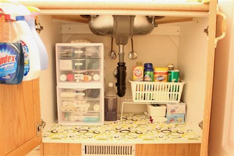 To maximize the space under the sink, acquire some clear plastic storage bins in varying sizes to organize products into categories. Bathroom Cabinet Organization