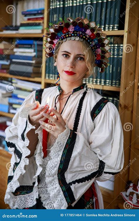 Beautiful Woman Dressed In Traditional Romanian Costume Stock Photo