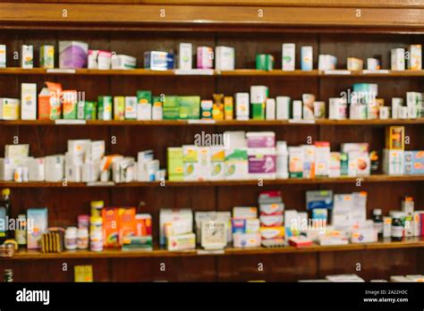 Pharmacy Interior With Blurred Background Wooden Shelves With Boxes Of