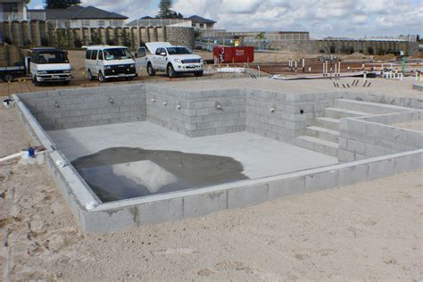 Pool builders who install concrete pools instruct the owners on how to brush the walls and bottom frequently to prevent algae buildup. diy swimming pool concrete blocks | Diy swimming pool, Concrete swimming pool, Building a ...