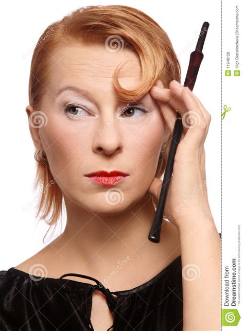 Woman With Cigarette Holder Royalty Free Stock Photos