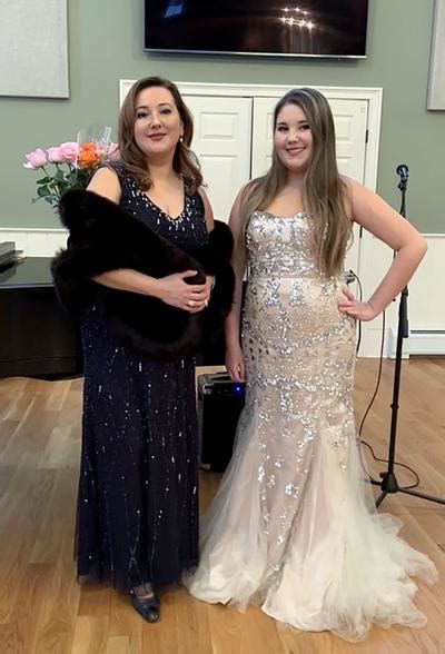 Mother Daughter Duo Sing At Library Entertainment