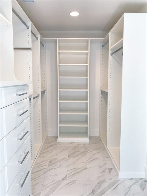 I was a custom closet designer at the time. Simply Done: White & Marble Custom Master Closet Heaven ...