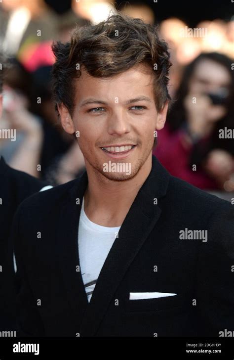 Louis Tomlinson Of One Direction Attending The UK Premiere Of This Is