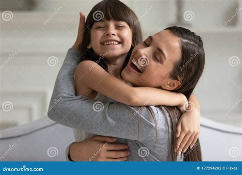 Happy Young Mom And Little Daughter Hugging Stock Photo Image Of