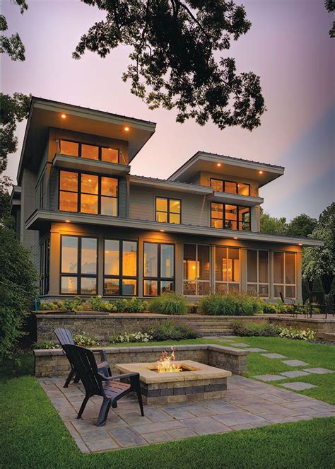 Get exterior design ideas for your modern house elevation with our 50 unique modern house facades. Modern lake house with low-sloped metal roof planes that ...