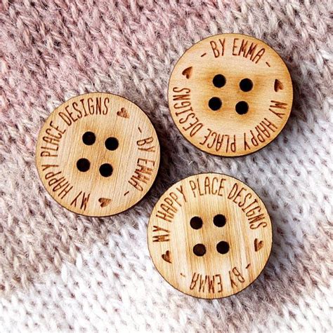 Three Wooden Buttons With Words On Them That Say Happy Place Designs