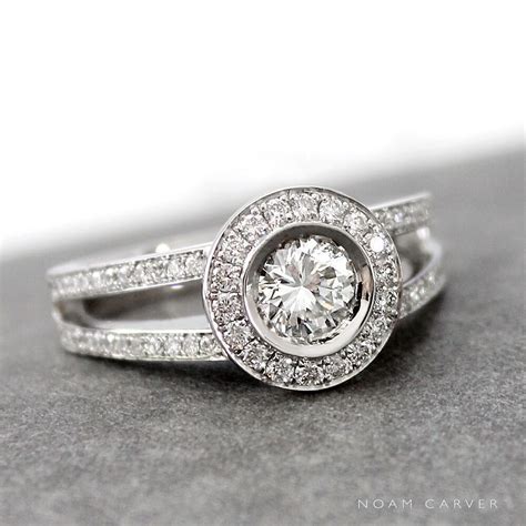 A Custom Made Bezel Set Halo Engagement Ring With A Split Band Rings
