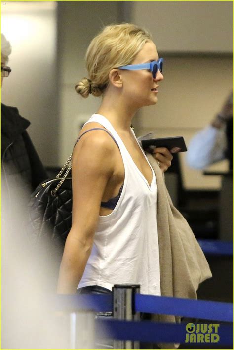 Kate Hudson Flashes Bra At The Airport Photo 2984164 Kate Hudson Pictures Just Jared