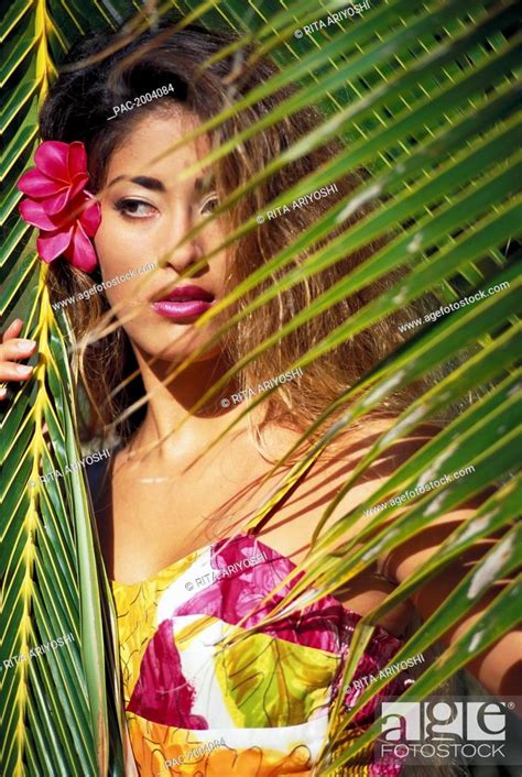 Portrait Of Hawaiian Woman Behind Palm Fronds Bust Shot Plumeria