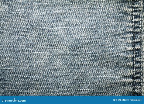 Close Up The Denim Blue Jeans Surface With Seam Texture Stock Image