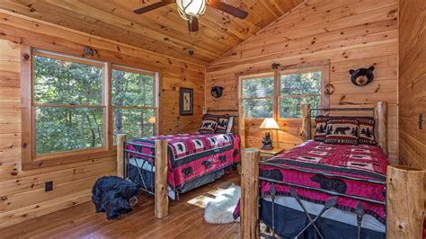 Prepare meals for the entire crew in the large, full kitchen equipped with dual refrigerators, ovens. Black Bear Lodge Cabin Rental Cabin Rentals