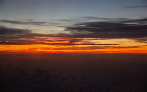 Sunset Under Dramatic Clouds · Free Stock Photo