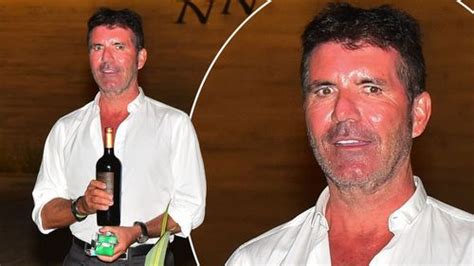 Simon Cowells Face Looks Frozen As He Celebrates 60th With Booze And