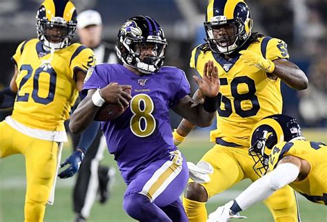 Lamar Jackson Ravens Are Giving Rams A Beat Down Up 28 6 At Halftime