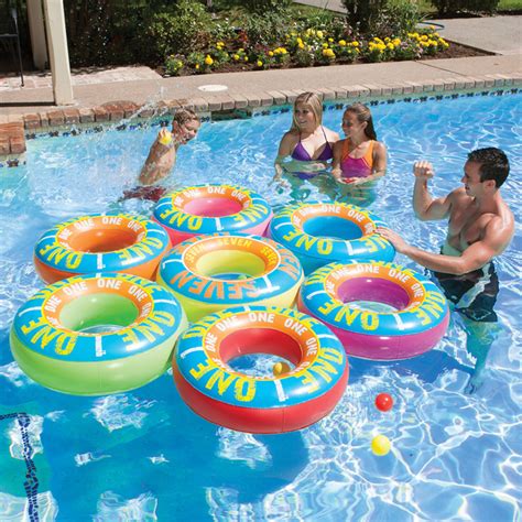 set of 7 vibrantly colored inflatable inner tube swimming pool game floats 76 inch pool central
