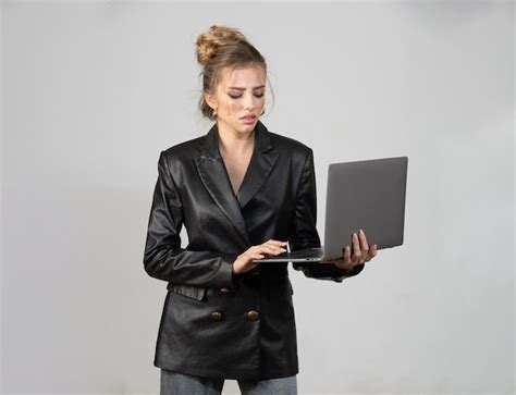 Premium Photo Sexy Serious Woman Using Laptop Computer Over Isolated Background