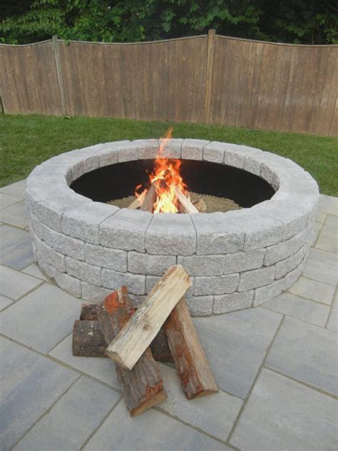 This fire pit features a wide fire bowl and strong, stable concrete construction. The Story Of Countryside 48 in. Gray Fire Pit Kit Has Just ...