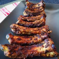 Grease a 9x13 inch glass pan with olive oil, then spread on about half the barbecue sauce. Baked Baby Back Pork Ribs - LisaEats