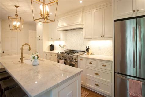 Clean sylistic design to enhance your contemporary, transitional or traditional decor. Custom white cabinets with antique brass fixtures and ...