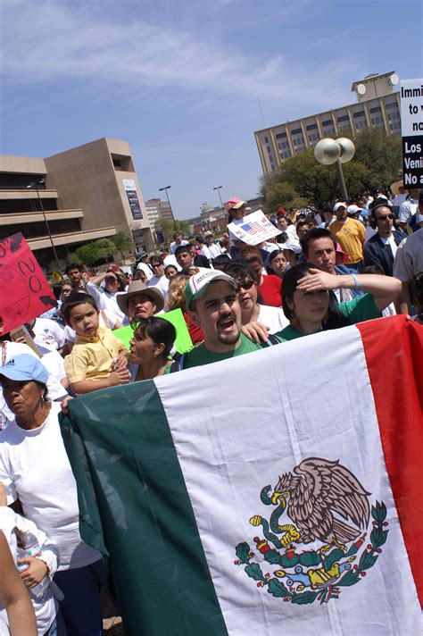 Man Holding Mexican Flag In Front Of Group Of Protesters The Portal To Texas History