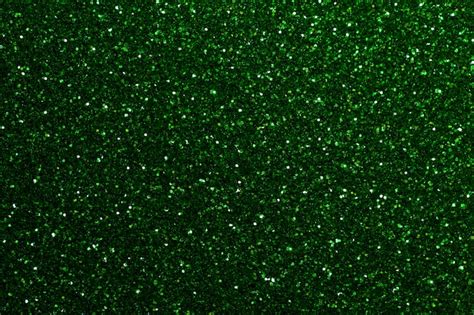 Premium Photo Dark Green Sparkling Background From Small Sequins