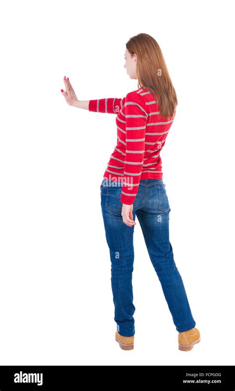 Back View Of Woman Young Woman Presses Down On Something Isolated