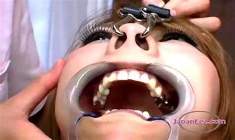 Asian Girl With Gag And Pignose Getting Her Tongue Sucked