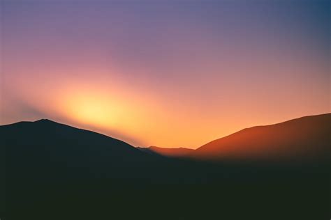 Silhouette Of Mountains During Sunset · Free Stock Photo