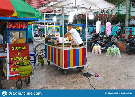 A Cotton Candy Seller Preparing As Stock To Sell To Children In A City