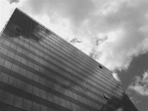 Gray Scale Photo Of High Rise Building · Free Stock Photo
