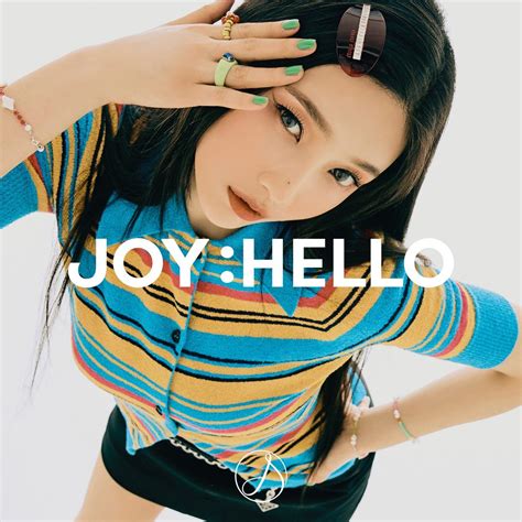 A Woman With Her Hands On Her Head And The Words Joy Hello Written In