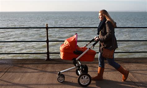 Woman Pushing Pram Wkcn