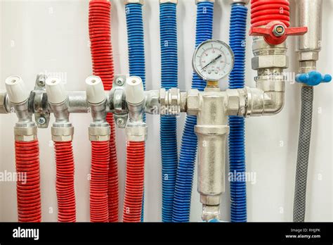 Plastic Pipes Of Central Heating System And Water Pipes In Apartment