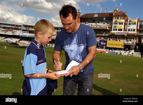 Surrey Lions Graham Signs An Autograph For Young Fan Hi Res Stock