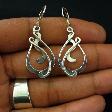 Silver mantra offers beautiful collection of 925 sterling silver earrings, handmade indian silver jewelry to celebrate every moment of your life at wholesale prices. Handmade Sterling Silver Twisted Wire Earrings