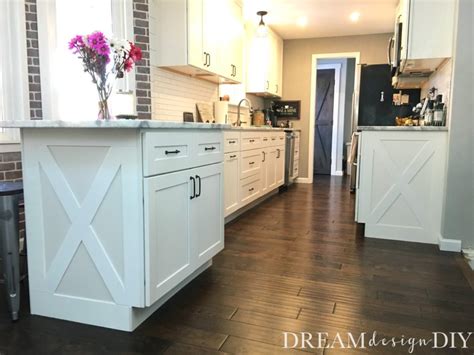 To do this i happen to have a piece of baseboard trim that i used to trace. Adding character to your kitchen - Farmhouse Cabinet Trim